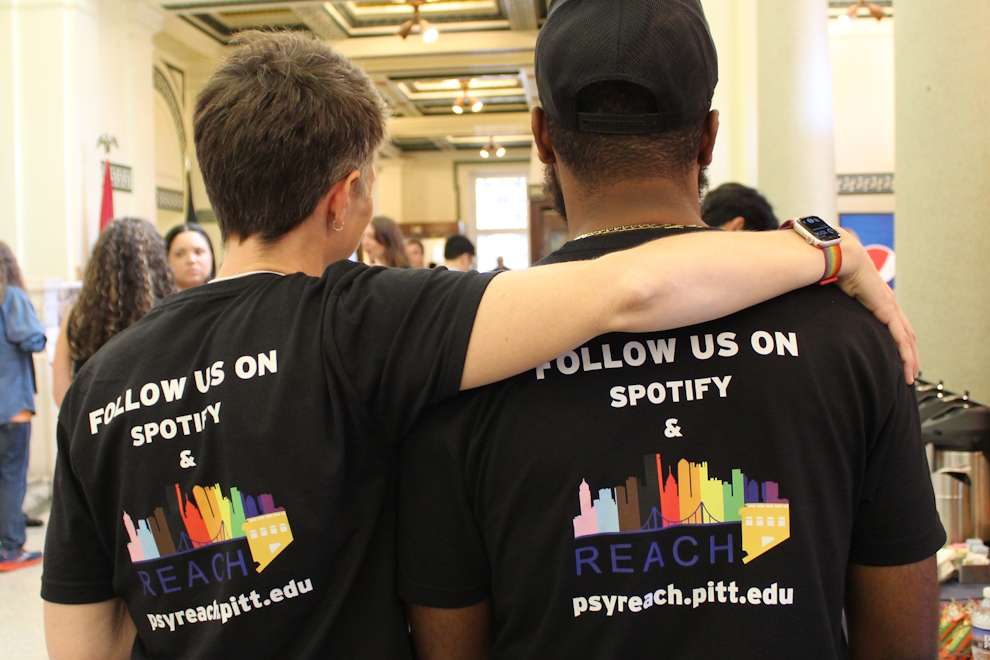Health equity researchers wearing tshirts promoting their podcast on health equity
