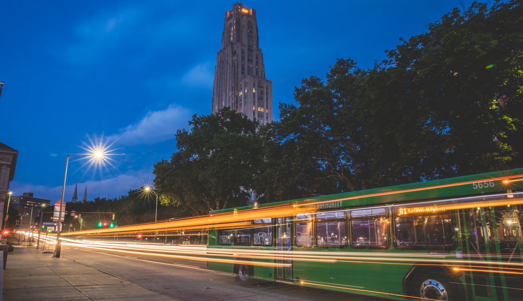 Port Authority bus driving through Pitt's Campus at Night