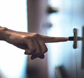 Man Pressing Doorbell