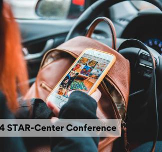 Person looking at tablet in car