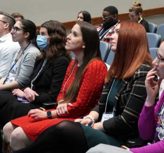 Clinician Educator Showcase Attendees in the Auditorium